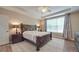 Main bedroom with large window and ceiling fan at 8100 Avanti Dr, Waxhaw, NC 28173