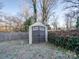 Storage shed in the backyard with wooden fence at 811 Colonial Dr, Rock Hill, SC 29730