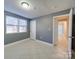 Basement bedroom with tile floors and access to hallway at 811 Colonial Dr, Rock Hill, SC 29730