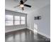 Bedroom with hardwood floors, ceiling fan, and TV mount at 811 Colonial Dr, Rock Hill, SC 29730