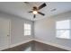 Well-lit bedroom with hardwood floors and ceiling fan at 811 Colonial Dr, Rock Hill, SC 29730