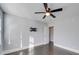 Spacious bedroom with hardwood floors, ceiling fan and window at 811 Colonial Dr, Rock Hill, SC 29730