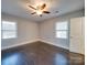 Bright bedroom featuring hardwood floors and ceiling fan at 811 Colonial Dr, Rock Hill, SC 29730