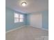 Bedroom with tile floors, double closet and ceiling light at 811 Colonial Dr, Rock Hill, SC 29730