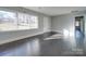 Living room with hardwood floors and large window at 811 Colonial Dr, Rock Hill, SC 29730