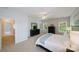 Bright bedroom with access to hallway and large dresser at 8191 Deep Water Ln, Denver, NC 28037