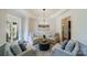 Bright dining room with chandelier and comfortable seating at 8191 Deep Water Ln, Denver, NC 28037