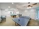 Finished basement recreation room with pool table and ping pong at 8191 Deep Water Ln, Denver, NC 28037