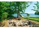 Relaxing patio with fire pit and lake views at 8191 Deep Water Ln, Denver, NC 28037