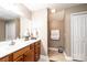 Well-appointed bathroom with double vanity and linen closet at 823 Wynnshire Dr # C, Hickory, NC 28601