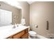 Convenient half bathroom with single vanity and toilet at 823 Wynnshire Dr # C, Hickory, NC 28601