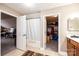 Bathroom with tub shower, and walk-in closet at 823 Wynnshire Dr # C, Hickory, NC 28601