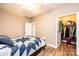 Well-lit bedroom with spacious closet and ceiling fan at 823 Wynnshire Dr # C, Hickory, NC 28601