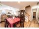 Spacious dining area with red tablecloth and hardwood floors at 823 Wynnshire Dr # C, Hickory, NC 28601