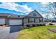 Beige house with attached garage and neatly landscaped front yard at 823 Wynnshire Dr # C, Hickory, NC 28601