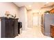 Kitchen hallway with tile flooring and extra storage at 823 Wynnshire Dr # C, Hickory, NC 28601