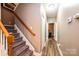 Upstairs hallway with wood flooring and access to bedrooms at 823 Wynnshire Dr # C, Hickory, NC 28601