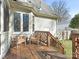 Relaxing deck with wooden chairs, perfect for outdoor enjoyment at 8406 Tifton Rd, Charlotte, NC 28226