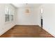 Bright dining room with hardwood floors and neutral walls at 8406 Tifton Rd, Charlotte, NC 28226