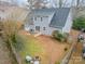 Aerial view of the house, backyard, and patio at 8708 Sweet Sage Ln, Charlotte, NC 28227