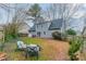 Gray house with deck and fenced backyard, offering a private outdoor space at 8708 Sweet Sage Ln, Charlotte, NC 28227