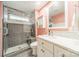 Bathroom with a walk-in shower and pink walls at 8708 Sweet Sage Ln, Charlotte, NC 28227