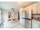 Bright kitchen with stainless steel appliances and eat-in area at 8708 Sweet Sage Ln, Charlotte, NC 28227