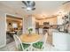 Bright kitchen with white cabinets, stainless steel appliances, and granite countertops at 8708 Sweet Sage Ln, Charlotte, NC 28227