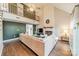 Open living room with high ceilings, hardwood floors, and a view of the kitchen at 8708 Sweet Sage Ln, Charlotte, NC 28227