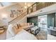 Living area with high ceilings, lofted area, and neutral color scheme at 8708 Sweet Sage Ln, Charlotte, NC 28227