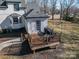 Elevated view of backyard deck and home's exterior at 910 S College Ave, Newton, NC 28658