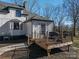 Deck with metal railing, string lights, and a gas grill at 910 S College Ave, Newton, NC 28658