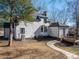 Spacious deck with black railing and string lights at 910 S College Ave, Newton, NC 28658