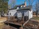 Deck with metal railings, seating area, and grill at 910 S College Ave, Newton, NC 28658