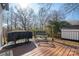 Back deck with seating area and grill at 910 S College Ave, Newton, NC 28658