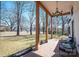 Relaxing front porch with seating and chandelier at 910 S College Ave, Newton, NC 28658