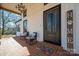 Welcoming front porch with seating area and entryway at 910 S College Ave, Newton, NC 28658