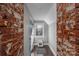 Hallway with exposed brick detailing and a pet area at 910 S College Ave, Newton, NC 28658