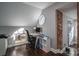 Bright home office features a desk, window, and exposed brick at 910 S College Ave, Newton, NC 28658