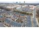 Aerial view of townhomes near shopping centers and a highway at 9223 Belcaro Ln, Charlotte, NC 28273