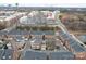 Aerial view of townhomes near shopping centers and a highway at 9223 Belcaro Ln, Charlotte, NC 28273