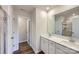 Main bathroom with double vanity and walk-in shower at 9858 Old Garden Cir, Gastonia, NC 28056