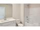 Clean bathroom, bathtub, toilet and vanity with a quartz countertop at 9858 Old Garden Cir, Gastonia, NC 28056