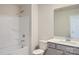 Clean bathroom with a tub, shower, and vanity at 9862 Old Garden Cir, Gastonia, NC 28056