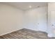 Versatile room with hardwood floors and a closet; ideal as an office at 9862 Old Garden Cir, Gastonia, NC 28056