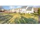 Expansive backyard with a view of neighboring houses at 11618 Macallano Dr, Charlotte, NC 28215