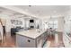 Open concept kitchen with granite island and stainless steel appliances at 11618 Macallano Dr, Charlotte, NC 28215