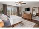 Main bedroom with king bed, wood dresser, and access to private deck at 126 Tall Pines Ct, Lake Wylie, SC 29710