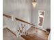 Elegant staircase with hardwood floors and chandelier at 126 Tall Pines Ct, Lake Wylie, SC 29710