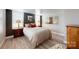 Bedroom with dark walls and hardwood floors at 13031 Westmoreland Farm Rd, Davidson, NC 28036
